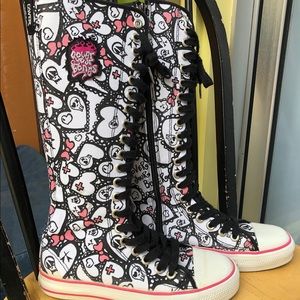 Cover your bones knee high sneaker boots